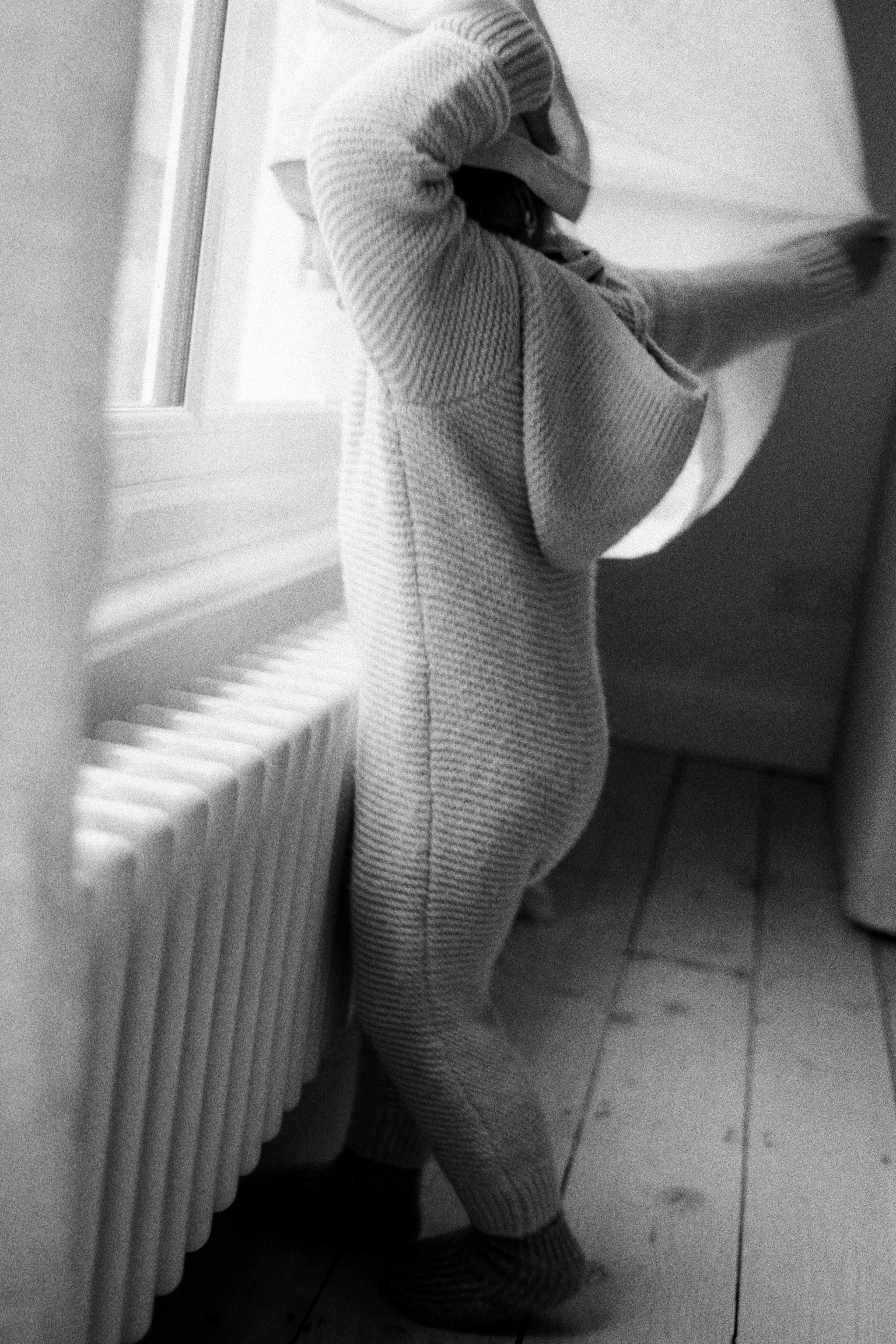 COMBINAISON LONGUE EN MAILLE ÉPAISSE À CAPUCHE